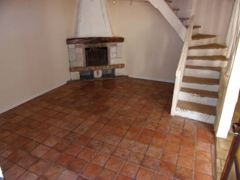 A vendre à LES DAMPS 27340 maison de ville avec cheminée