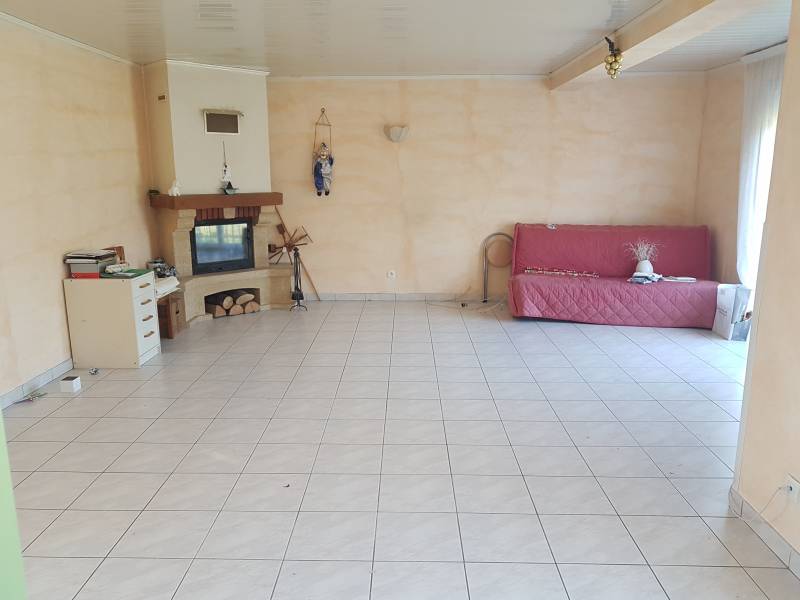 Vends maison de 125 m² avec un grand séjour un sous sol et un jardin à Pont de l'arche