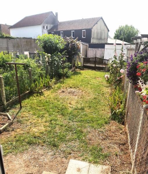 Maison en plein centre ville de 70m² environ avec jardin et garage PONT DE L'ARCHE  