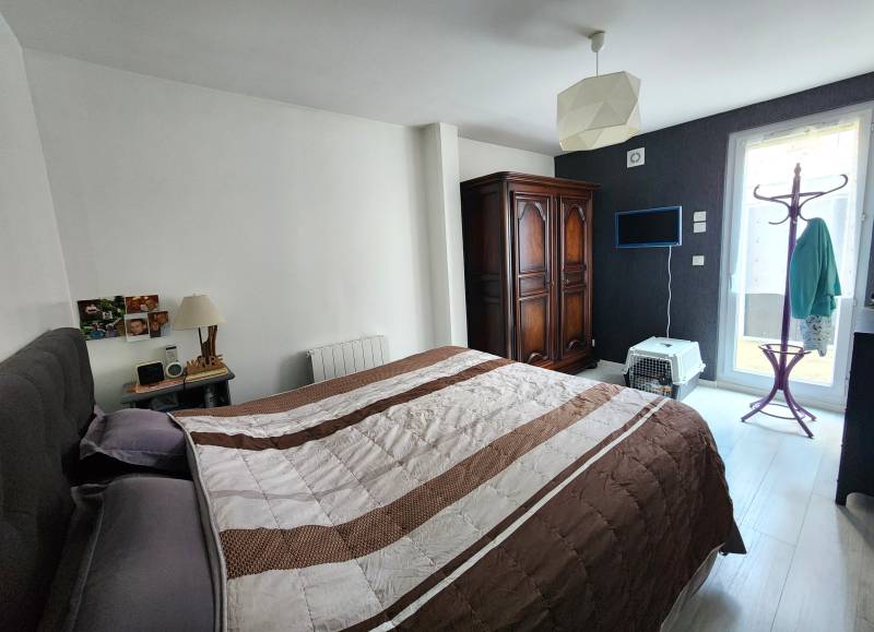 Chambre principale – Un espace confortable et lumineux