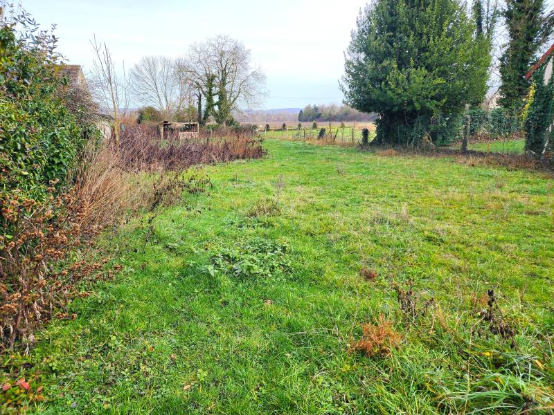 Terrain à vendre à Léry (27690) – 1 120 m² plat, au calme, proche A13 et gare SNCF