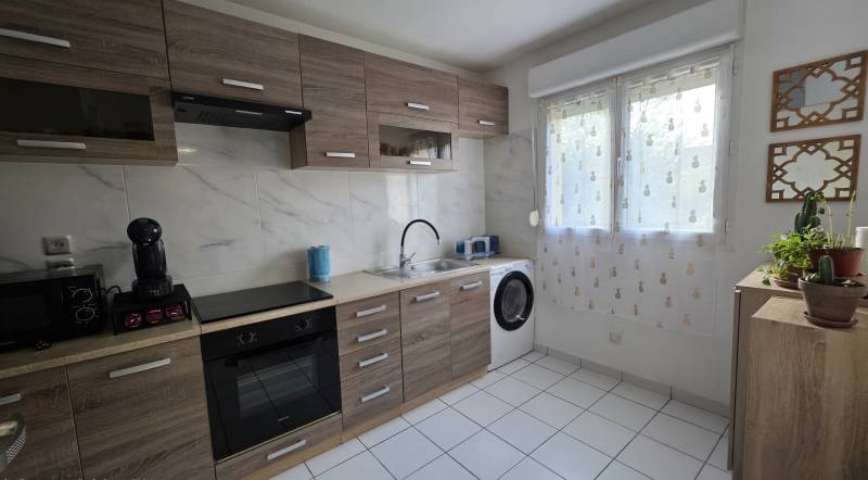 Maison familiale 4 pièces avec terrasse et garage à Val-de-Reuil