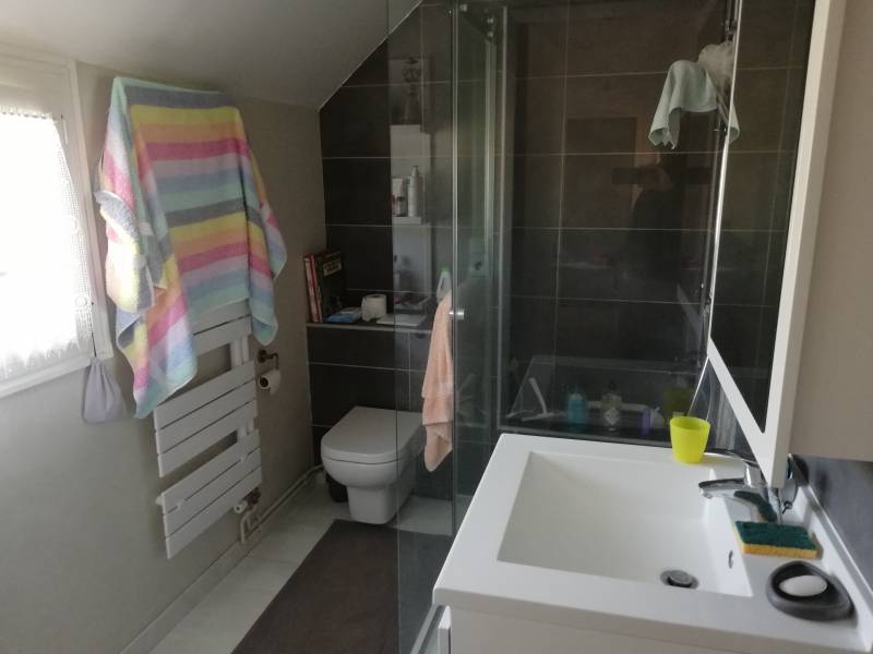 Maison de ville avec garage et place de parking